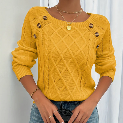 YVON | GEBREIDE TRUI MET KNOOPDETAILS
